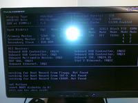 ASRock P4i45E - pokazuje 128 MB karty graficznej, potem czarny ekran