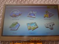 Jak wymienić zintegrowany touch screen w Pentagram Nomad P 5210?