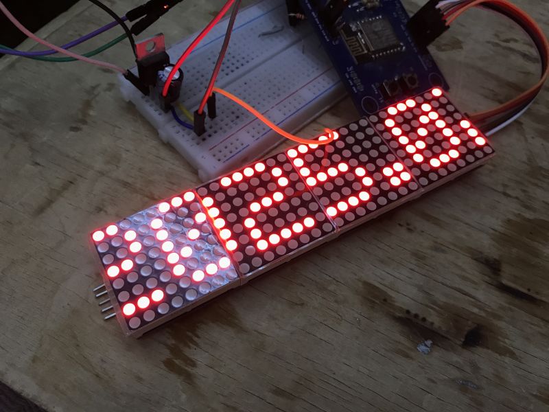 Digital LED Clock with ESP Module LED display showing time connected to a breadboard.
