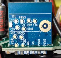 WB2S Electronic Module with Pin Labels Close-up of a WB2S electronic module with visible pins and printed labels.
