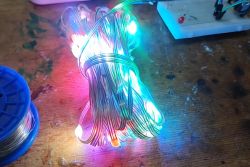 WS2812 LED Strip with Multicolored Lights Coiled WS2812 LED strip with multicolored lights.