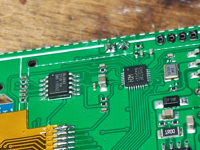 CH573F Microcontroller and BL0942 Chip on PCB Close-up of a PCB with CH573F microcontroller and BL0942 chip.