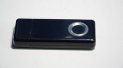 Black USB flash drive with a fingerprint reader.