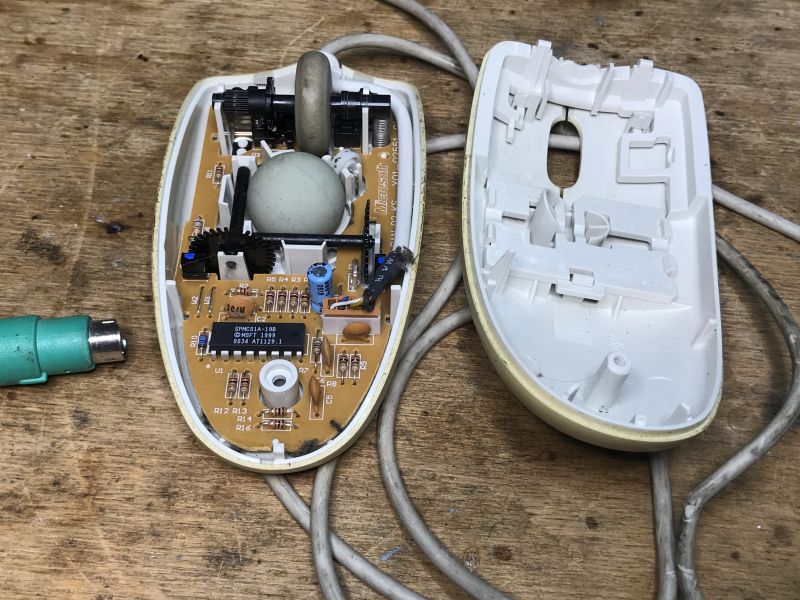 Interior of an Old Ball Mouse Interior of an opened ball mouse showing electronics and mechanism.