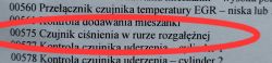 Zbliżenie na tekst z błędem 00575 Czujnik ciśnienia w rurze rozgałęźnej z zaznaczeniem czerwonym okręgiem.