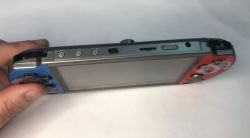 Portable X12 1100+ games console with TV output - test, interior, construction