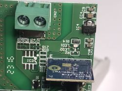 PCB with WiFi Module in ATLO-B1-Tuya Device Close-up of a PCB with a WiFi module.