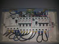 High-Pitched Sound from Fuse Box when 3.5 kW Air Conditioner is On in a 12.5 kW Apartment