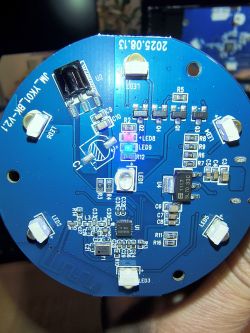 Close-up of PCB with T1-AHL AUS068XA chip and electronic components