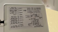 Wiring diagram inside a device showing connectors, optional parts, and internal wiring layout.