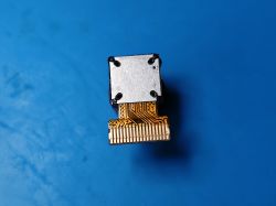 Mini Camera Module with Shielding and FFC Cable Mini camera module with 18-pin FFC ZIF connector on a blue background, viewed from the shielding side.