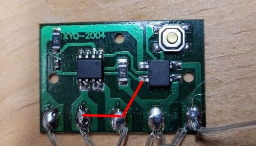 Close-up of a small circuit board with several electronic components.