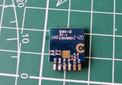 Top side of the WBR2 module with visible markings and solder pads.