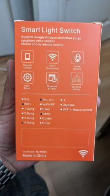 Smart Wall Switch Packaging Smart wall switch packaging with Wi-Fi and Zigbee features.