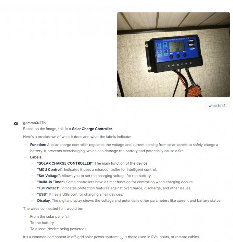 Wall-Mounted Solar Charge Controller Solar charge controller mounted on a wall with a display and connected wires.