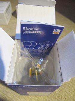 Sonoff B02-F-A60 filament bulb in its box with the user guide visible.