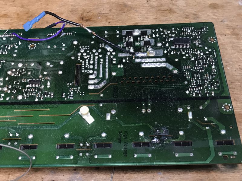 Bottom of Motherboard with MOSFET Transistors Bottom of a motherboard with recovered MOSFET transistors