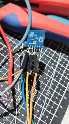YP-2422 module connected with jumper wires on a measurement mat