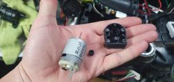 Motor and housing of AdBlue pump on a hand.