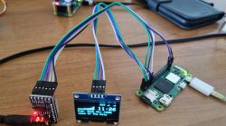 Electronic modules connected with jumper wires to a Raspberry Pi Zero 2W