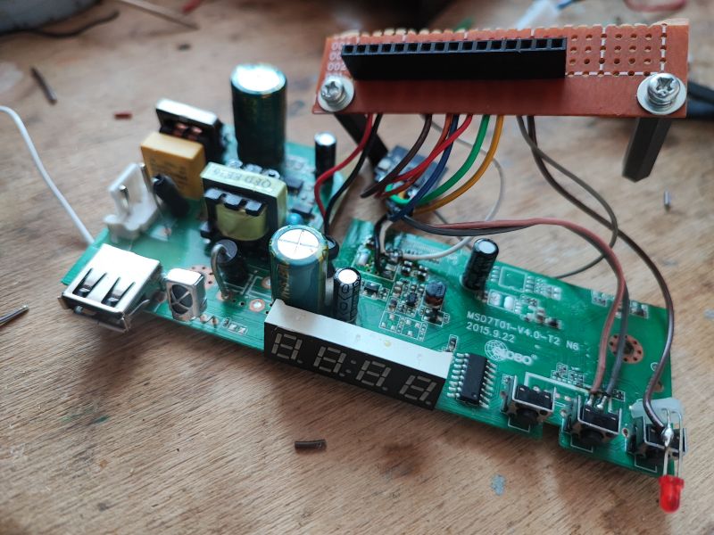 Circuit Board with LED Display and USB Port Circuit board with attached wires, LED display, and USB port.