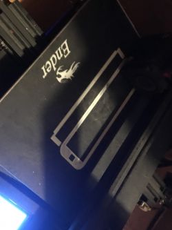 3D Printed Case Part on Ender 3 Pro 3D printed case part on the printer bed.
