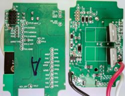 Interior of a Dimmer's Electronic Circuitry Close-up of the electronic circuit inside a dimmer with visible PCB traces and components.