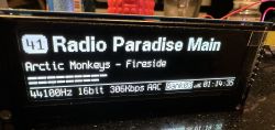 Radio display with station information Radio display showing the station Radio Paradise Main and the track Arctic Monkeys - Fireside.