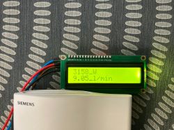 LCD display showing values: 3158 W and 9.051/min, connected to a Siemens device.
