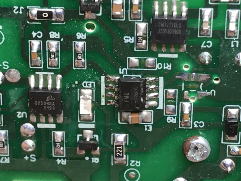 PCB with Electronic Components Close-up of a PCB with electronic components.