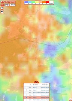 Mapa Olkusza z kolorową mapą zasięgu DVB‑T (dBµV/m) i tabelą kanałów MUX na dole