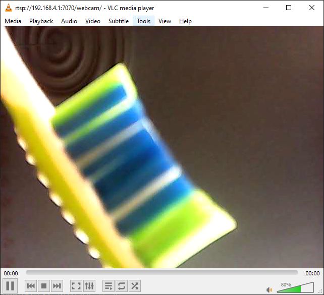 Close-up of toothbrush head with multicolored bristles Close-up of a toothbrush head with colorful bristles