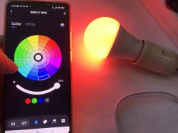 Controlling Tuya LED Bulb with Mobile App Colorful Tuya LED bulb controlled by a smartphone app.