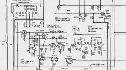 Fragment schematu ideowego urządzenia elektronicznego z naniesionymi oznaczeniami elementów i połączeń.