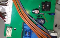 Siemens IQ100 - Brak reakcji, napięcie na programatorze, osmolone miejsca, wymiana modułu