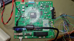 Samsung 225MW Mainboard with Debugging Cables Samsung 225MW TV motherboard with connected debugging cables