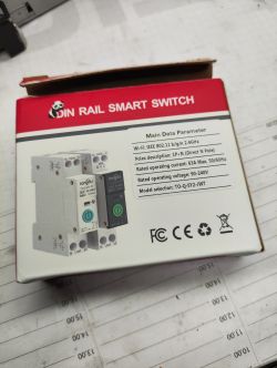 Photo of a DIN Rail Smart Switch box with technical data.