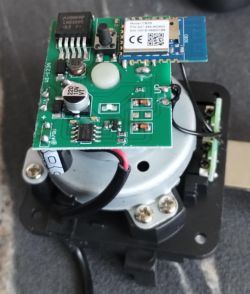 The interior of the ATLO-V1-TUYA actuator after removing the top cover, showing the electronic circuit boards with components.