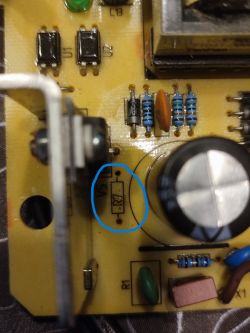 Section of a PCB with various electronic components and an unpopulated spot for resistor R7 marked in blue.