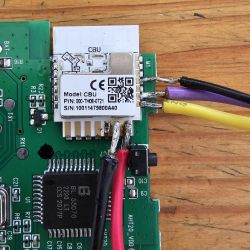 PCB with CBU module and colored wires.