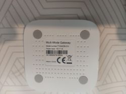 Multi-Mode Gateway with Label Photo of the back of a multi-mode gateway with a model label.