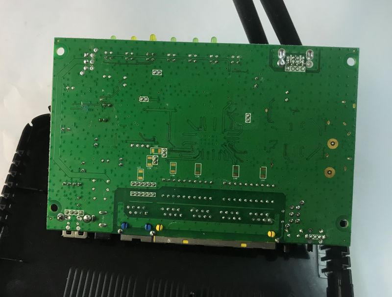 Analysis of the inside of the router, memory ripping, bootloader, custom program for UART