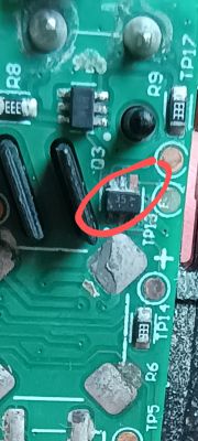 SMD Component Marking on Circuit Board Close-up of a circuit board fragment with a marked SMD component labeled 35.
