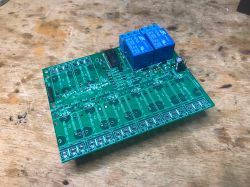 Circuit board with relay module and electronic components