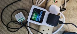 Atorch S1 meter display showing various electrical measurements.
