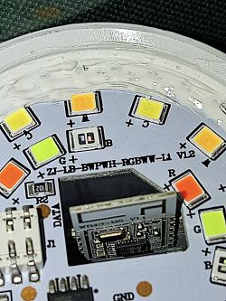 White LSC Smart Connect LED bulb with technical markings on the base, photographed on a white surface.