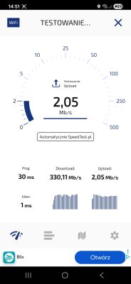 Wynik testu prędkości łącza internetowego na urządzeniu mobilnym Ekran testu prędkości internetu z wynikiem upload 2,05 Mb/s i download 330,11 Mb/s