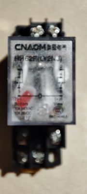 HJQ-62F Relay for Actuator Connection View of a relay with model markings HJQ-62F and operational parameters.
