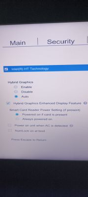 Zdjęcie ekranu ustawień BIOS-u z opcjami grafiki hybrydowej i ustawieniami karty Intel HT.