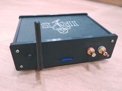 Black metal audio device enclosure with antenna, RCA jacks, and USB-C port